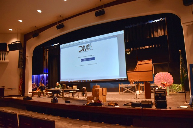 Large video screen in the Newfield High School Auditorium - part of the renovation design completed by AVL Designs Inc. 