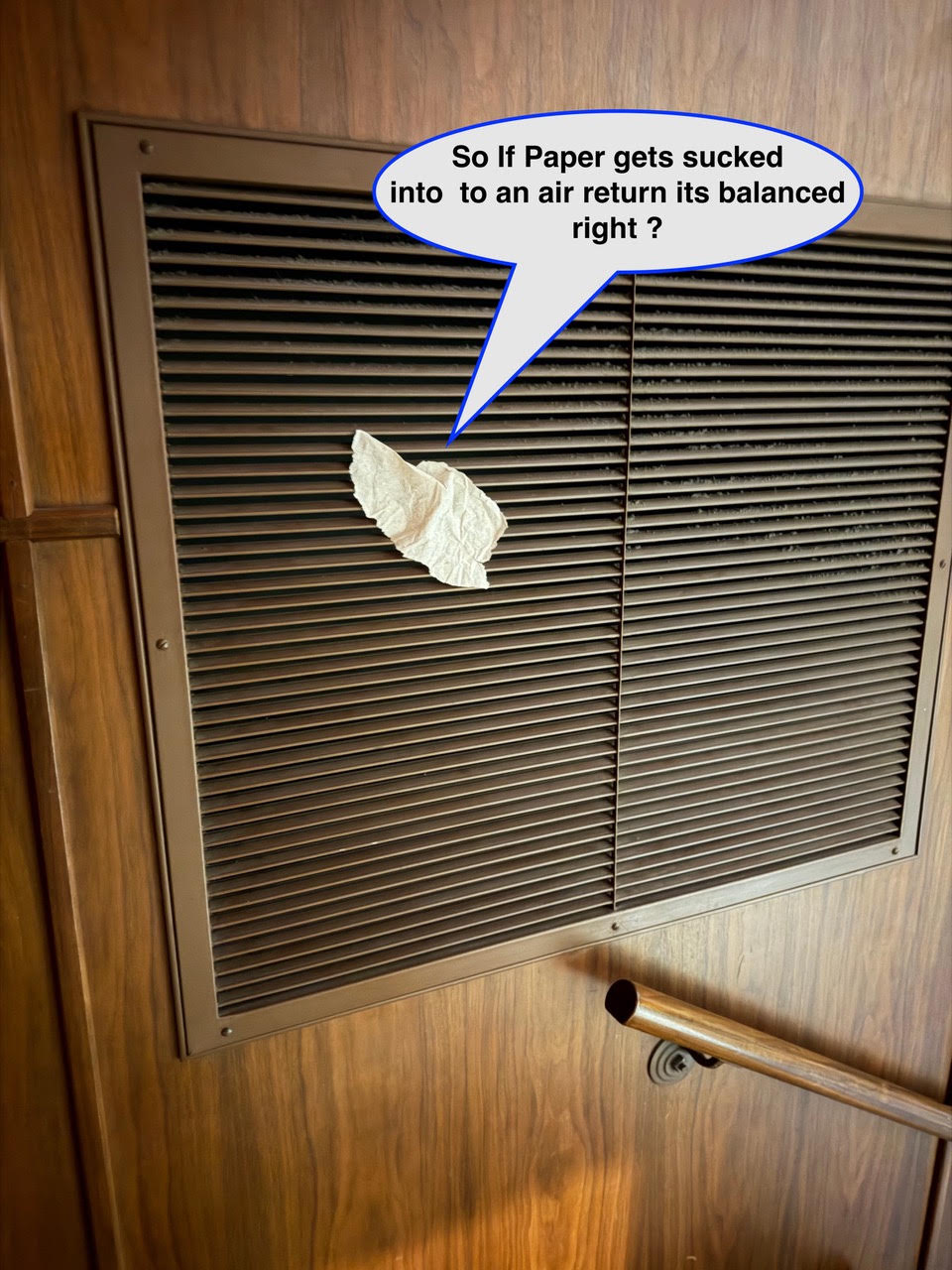 WOS August 5 Torn scrap of paper stuck to an HVAC vent with a cartoon speech bubble saying, 'So if paper gets sucked into an air return its balanced right?'; wood-paneled wall in the background.